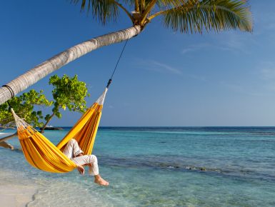Yellow hammock on the beach