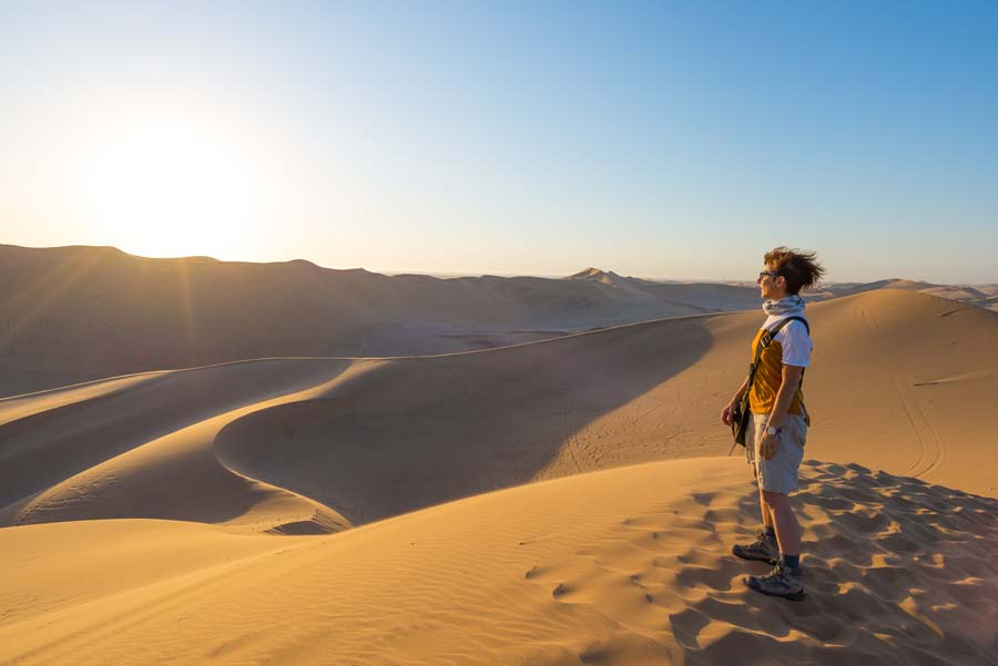 woman standing on a desert in Namibia