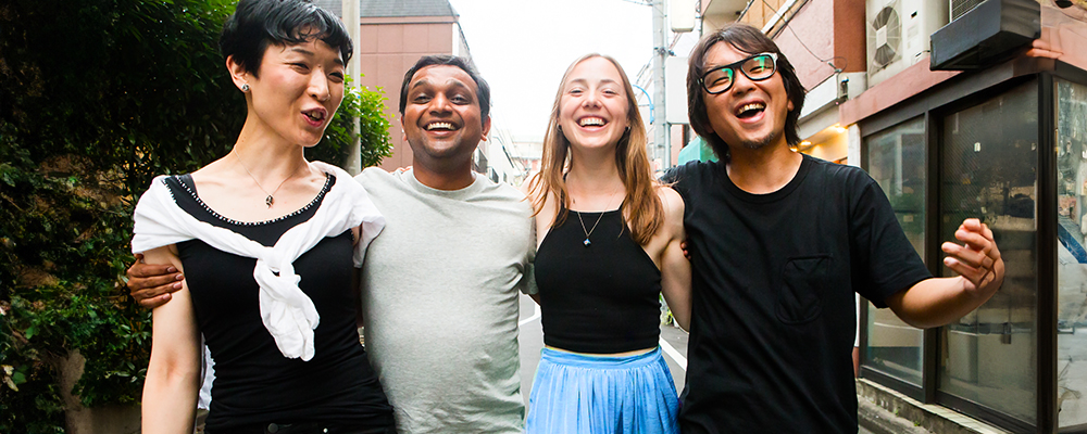 Group of friends walking in the street
