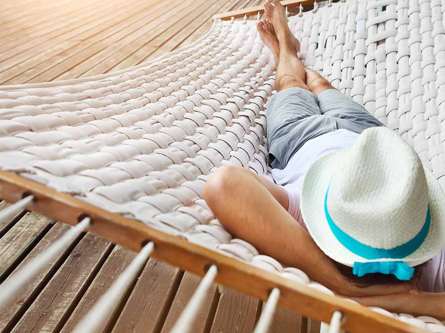 Woman relaxing on a hammock