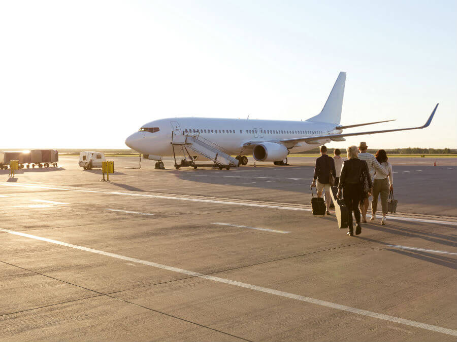 Passengers about to board a plane