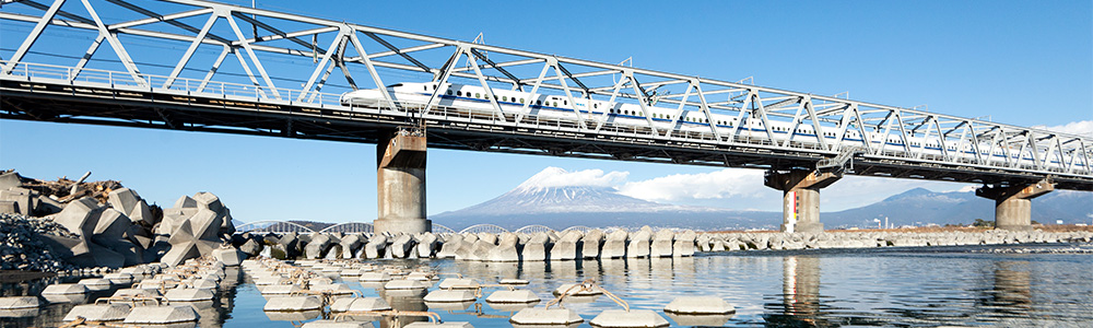 Bullet train going over bridge in Japan