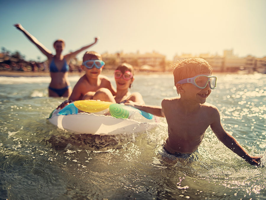 Children playing in the ocean