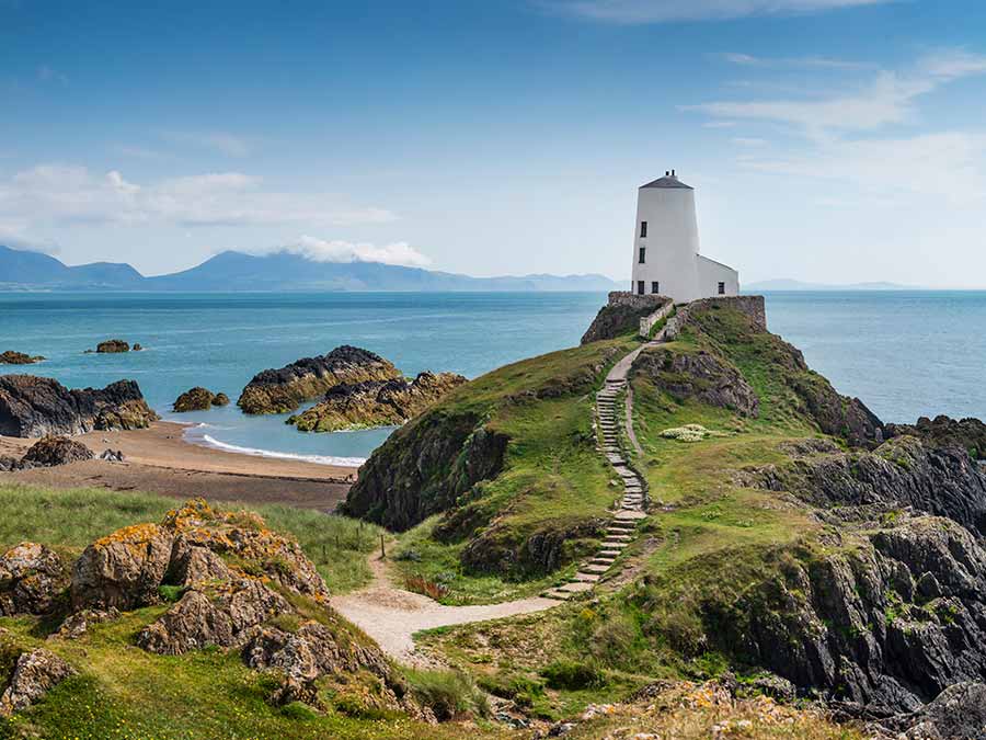 Lightouse on a hill overlooking the Menai Straits, Llanddwyn Island, Anglesey, North Wales